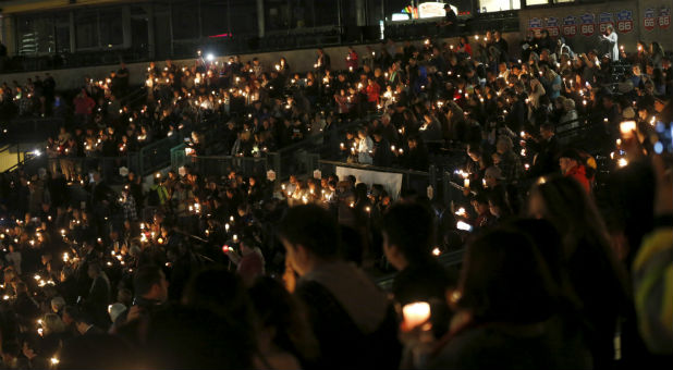 Thousands gathered at the San Manuel Stadium for a prayer vigil.