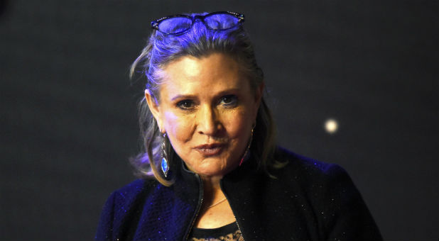 Carrie Fisher called out those 'offended' by Lord's Prayer ad.