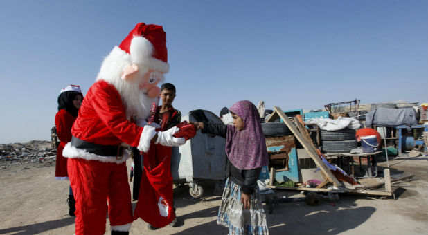Baghdad is holding Christmas celebrations in a sign of brotherhood with Iraq's hard-pressed Christians.