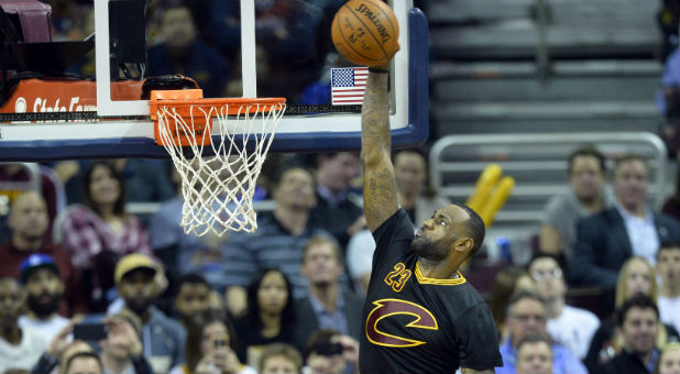 LeBron James dunks the ball in a recent game.