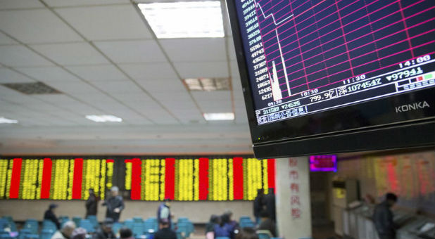 A screen showing the stock information after the new circuit breaker mechanism suspended Thursday's stocks trading, at a brokerage house in Nanjing, Jiangsu province, China.