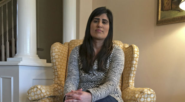 The wife of Saeed Abedini, an American pastor freed this month from an Iranian prison as part of a prisoner swap, said on Wednesday that her husband had threatened the end of their marriage and she had taken legal action to ensure their children remain in Idaho.
