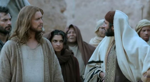 Jesus talks to a pharisee in a scene from 'The Bible.'