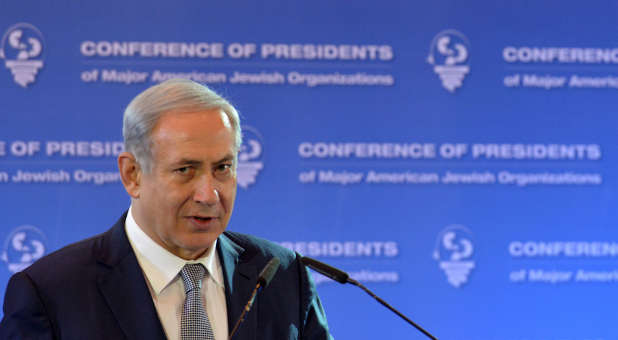 Israeli Prime Minister Benjamin Netanyahu addresses visiting leaders from the Conference of Presidents of Major American Jewish Organizations at the Inbal hotel in Jerusalem on Feb. 14, 2016.
