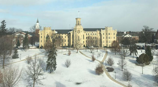 A professor at an evangelical university near Chicago who got in trouble after saying Muslims and Christians worship the same God will leave the school, according to a joint statement released by Wheaton College on Saturday night.