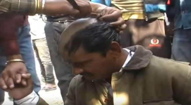 Hindu activists mobbed a Christian man, shaved his head and forced him to parade on a donkey.