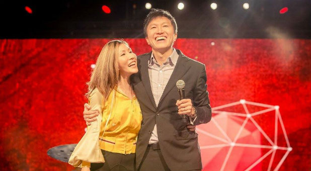 Pastor Kong Hee with his wife Sun Ho.