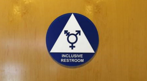An inclusive restroom sign