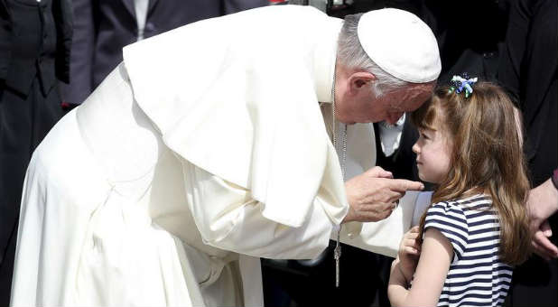 Pope Francis talks with Elizabeth 'Lizzy' Myers.