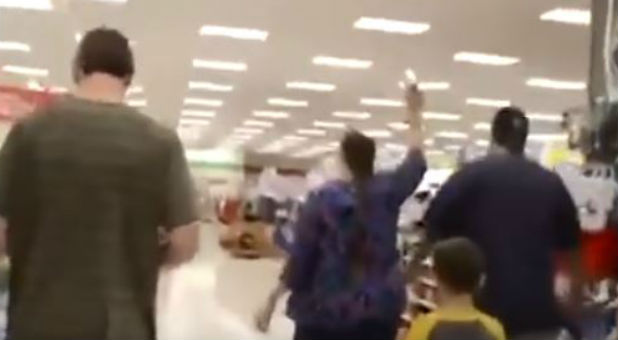 A mother marches through Target with her kids