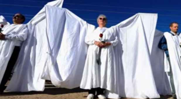 Their large wings formed a wall that shielded mourners from the Westboro picketers.