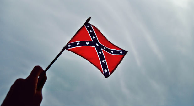 The U.S. Southern Baptist Convention adopted a resolution on Tuesday repudiating the Confederate battle flag as an emblem of slavery, marking the latest bid for racial reconciliation by America's largest Protestant denomination.