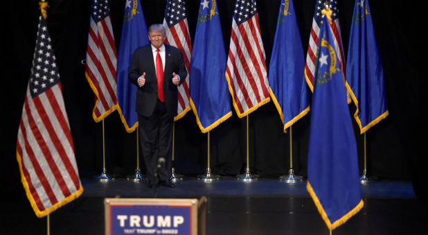 Republican U.S. presidential candidate Donald Trump walks on stage before he speaking at a campaign rally