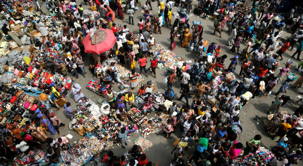 People crowd a market square in Lagos, Nigeria.