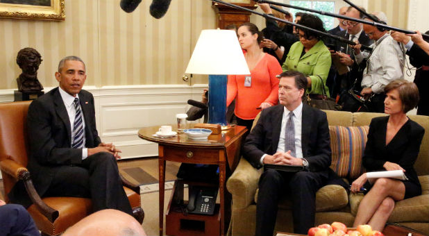 U.S. President Barack Obama attends a meeting with FBI Director James Comey (C), Deputy Attorney General Sally Yates (R) along with DHS Secretary Charles Johnson (not pictured) and NCTC Director Nicholas Rasmussen (not pictured) at the Oval Office of the White House