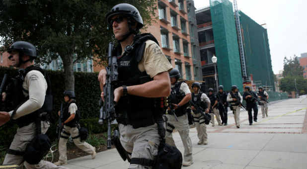 A Los Angeles Metro Police squad conducts a search on the University of California, Los Angeles (UCLA) campus after it was placed on lockdown following reports of a shooter on the campus