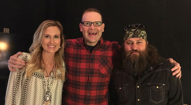 Perry Noble, center, with Korie and Willie Robertson.