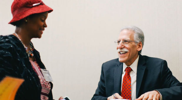 Dr. Michael Brown, right, at a book signing.