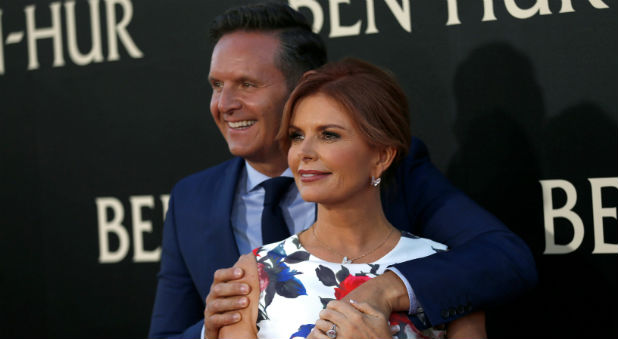 Executive producer Roma Downey and her husband producer Mark Burnett pose at the premiere for the movie
