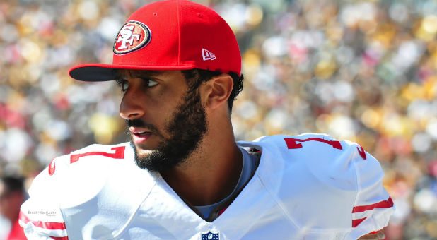 Outrage is growing over San Francisco 49ers quarterback Colin Kaepernick's refusal to stand for the national anthem.