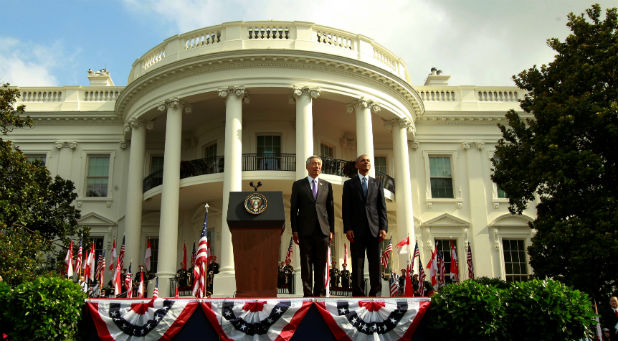 U.S. President Barack Obama and Singapore's Prime Minister Lee Hsien Loong stand together during an official arrival ceremony on the South Lawn of the White House in Washington, U.S.