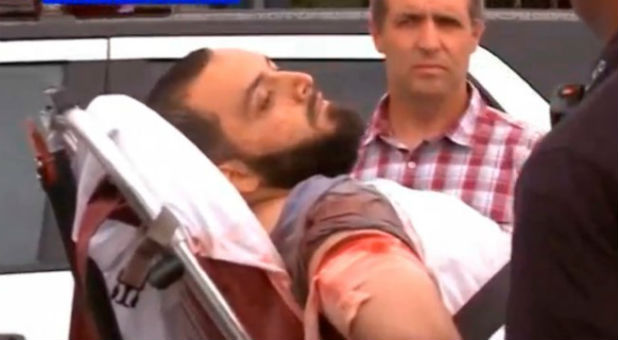 New York bombing suspect Ahmad Khan Rahami being loaded into an ambulance after a shoot-out with police