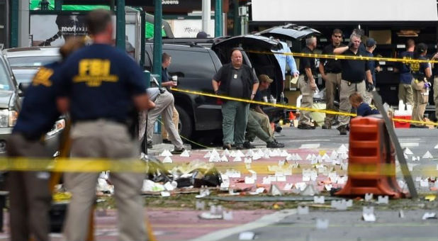 FBI officials stand amid site of explosion in New York