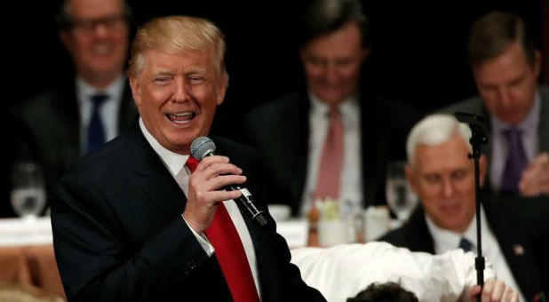 Republican presidential nominee Donald Trump gestures as he speaks to the Economic Club of New York luncheon in Manhattan