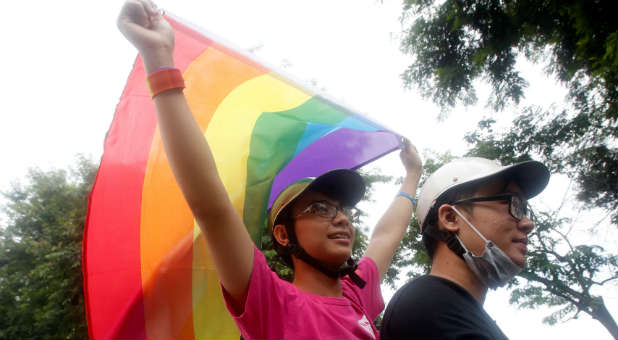 Participants attend an LGBT pride parade.