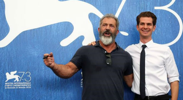 Director and actor Mel Gibson (L) and actor Andrew Garfield attend the photocall for the movie