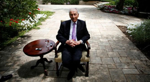Israel's President Shimon Peres speaks during an interview with Reuters at his residence in Jerusalem, June 2013.