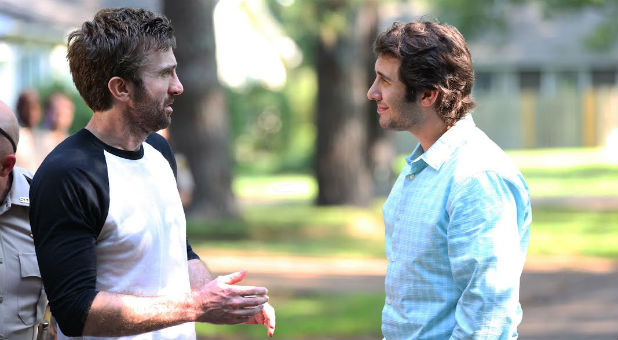 Sharlto Copley and Josh Groban in a scene for 'The Hollars.'