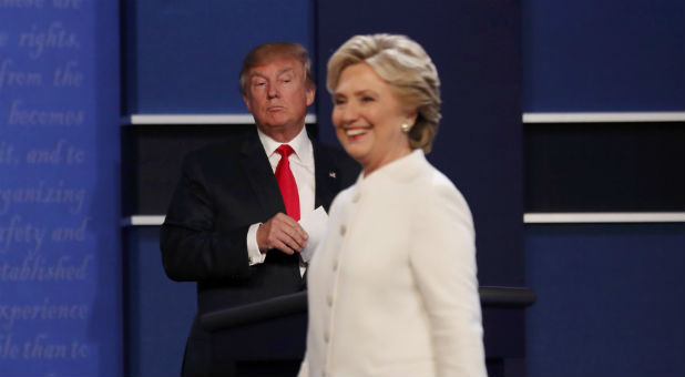 Republican U.S. presidential nominee Donald Trump and Democratic U.S. presidential nominee Hillary Clinton finish their third and final 2016 presidential campaign debate at UNLV in Las Vegas, Nevada.