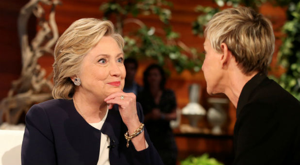 U.S. Democratic presidential nominee Hillary Clinton chats to Ellen DeGeneres during a commercial break in taping of the Ellen Show