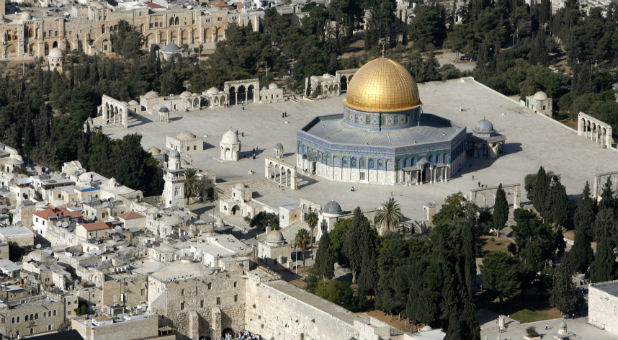 An aerial view shows the Dome of the Rock (R) on the compound known to Muslims as the Noble Sanctuary and to Jews as Temple Mount, and the Western Wall (L) in Jerusalem's Old City