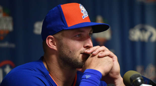 Tim Tebow prayed for a fan.