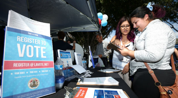 Marissa Jimenez, 22, registers to vote on National Voter Registration Day at the Los Angeles County Registrar-Recorder/County Clerk's office in Norwalk, Los Angeles