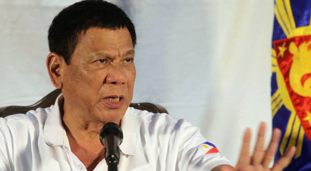 Philippine President Rodrigo Duterte speaks during a news conference in Davao city, southern Philippines