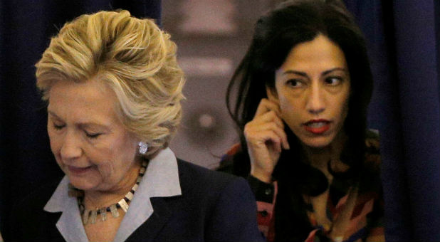 Hillary Clinton with top aide Huma Abedin.