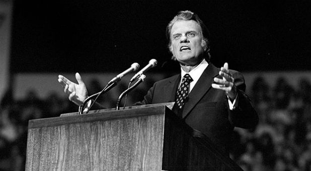 Billy Graham preaches during his Tidewater Virginia Crusade, held jointly in the cities of Norfolk and Hampton, Virginia.
