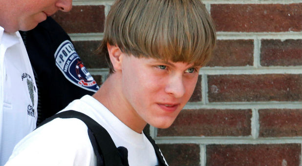 Dylann Roof leaves courthouse in June 2015 after Charleston, South Carolina, church shooting.