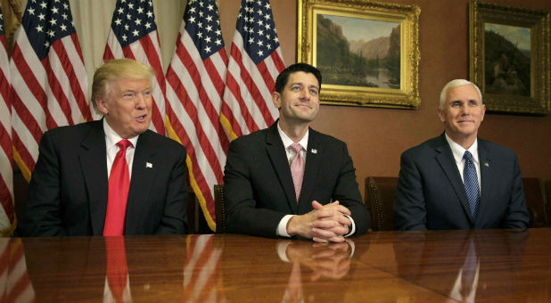 U.S. President-elect Donald Trump (L) meets with Speaker of the House Paul Ryan (R-WI) (C) and Vice-President elect Mike Pence on Capitol Hill in Washington