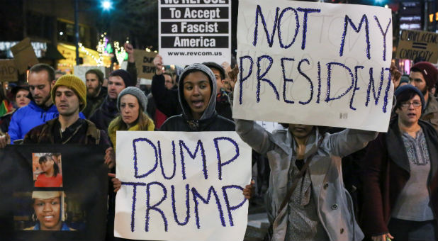 Demonstrators shout during a rally against U.S. President-elect Donald Trump in Seattle