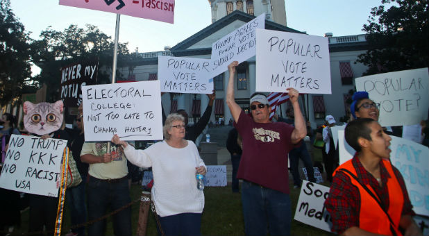 Protesters demonstrate against the election of Republican Donald Trump as president of the United States in Tallahassee