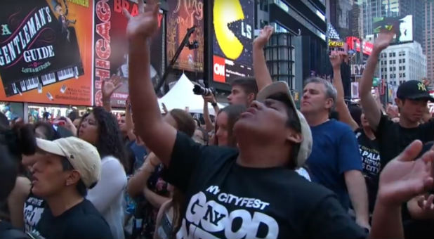 Believers worship in Times Square.