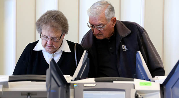 Voting Elderly Couple