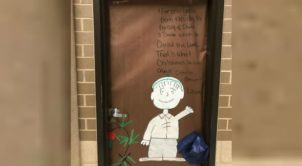 A teacher posted this Charlie Brown Christmas door decoration.