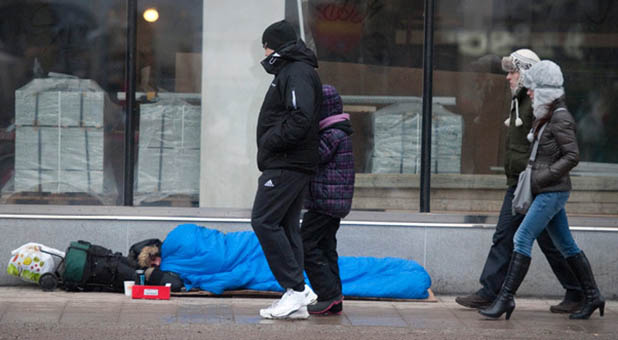 Homeless Person Sleeping on Street