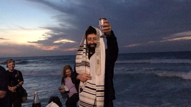 Jonathan Cahn opens his tour of Israel on the shores of Tel Aviv, Israel.