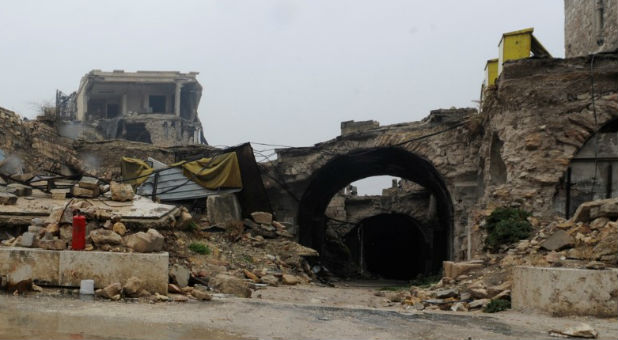 A general view shows damage on the entrance to al-Zarab souk in the Old city of Aleppo, Syria